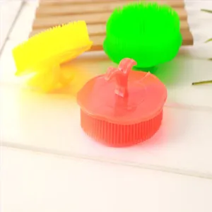 Close-up of silicone scalp massage hair brush, soft bristles for deep cleaning and relaxing.