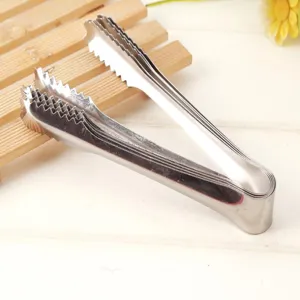 Stainless steel ice tong detail, durable kitchen food clamp for buffet, BBQ, and sugar use.