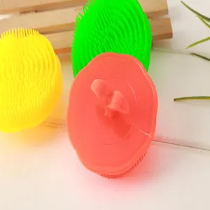 Silicone scalp massage shampoo brush detail view, soft bristles for effective hair washing.