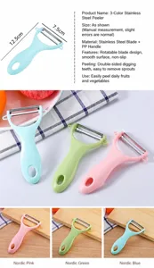 Stainless steel fruit peeler with swiveling blade and potato eye remover for kitchen use.