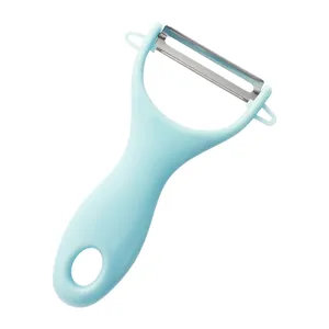 Stainless steel vegetable peeler with light blue plastic handle, kitchen fruit peeling tool.