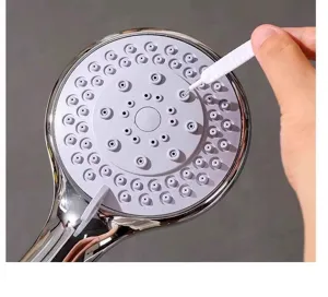 Mini shower hole cleaning brush detail, fine nozzle brush for bathroom gap cleaning tool.