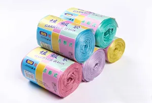 Detail shot of colorful roll garbage bags, 50x60cm size, break-point design for easy use.