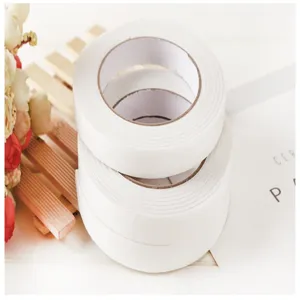 White double-sided foam tape detail view, strong adhesive foam tape for office and household use.