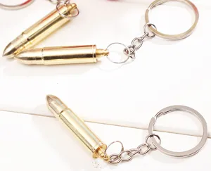 Metal bullet shaped ear spoon keychain portable creative brass metal pocket tool keyring.