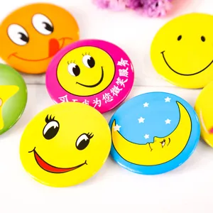 Colorful metal smiley face badges set, cute cartoon pin buttons for backpacks and clothes.