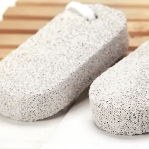 Natural volcanic foot pumice stone with hanging rope for removing dead skin and calluses.