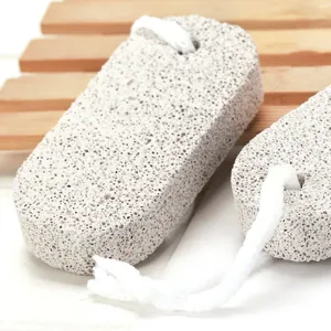 Natural volcanic pumice stone foot scrubber for dead skin and callus removal with hanging cord.