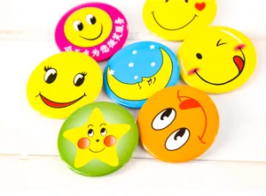 Colorful tinplate smiley face badges and cartoon expression brooches wholesale, durable metal pins.