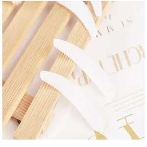 Plastic cosmetic spatula for face mask and cream shaping DIY makeup tool packaging use detail view