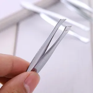 Stainless steel eyebrow tweezers slanted tip beauty tool for precise plucking and makeup application.