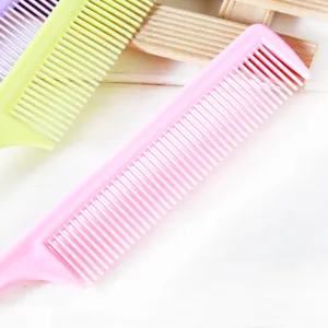 Professional plastic hair tail comb with sectioning design for styling and hairdressing.