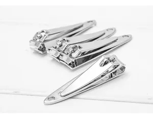 Stainless steel nail clipper set, smooth electroplated finish, durable home manicure tool.