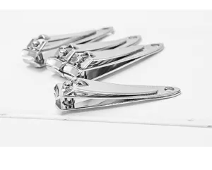 Stainless steel electroplated smooth nail clipper detail, compact metal cutter with keyring hole.