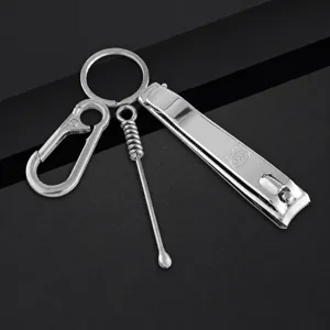 Stainless steel nail clipper set with keychain and ear pick, portable grooming kit for daily use.