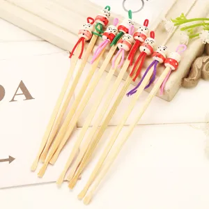 Natural bamboo ear wax removal spoon set with cute wooden doll head and colorful ropes