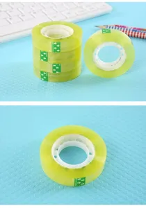 Small transparent adhesive tape rolls for office and school stationery use, clear and high viscosity.