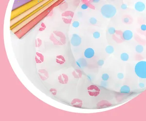 Thick waterproof EVA shower cap with cute lip print and blue polka dot design for hair protection.