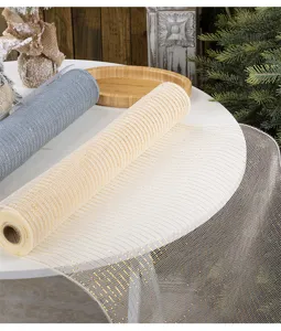 Decorative gold and silver PP mesh ribbon rolls for Christmas tree ornaments and crafts.