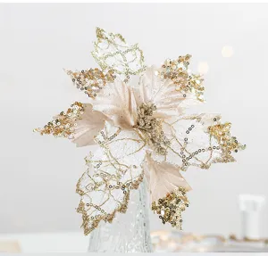 Detailed view of champagne Christmas flower with gold sequins and velvet petals
