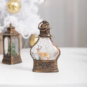 Vintage bronze Christmas snow globe lantern with deer miniature and glitter snow
