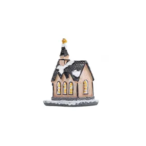 Detailed miniature resin Christmas church ornament with faux snow-covered roof