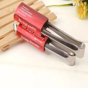 Stainless steel ice tongs detail shot, featuring durable metal construction and red packaging band.