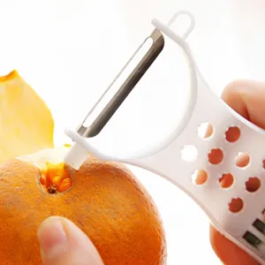 Pelador multifuncional plástico frutas verduras hoja acero inoxidable vista principal cocina