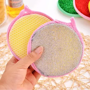 Round double-sided cleaning sponge dishwashing cloth with pink border for kitchen pot washing.