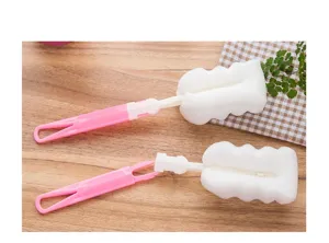 Abklappbare Schwamm-Flaschenbürste mit langem rosa Griff zur einfachen Glas- und Tassenreinigung.