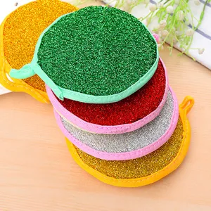 Colorful round double-sided dishwashing sponge cleaning pads for kitchen pots and pans.