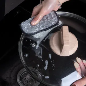 Double layer thickened silver wire dishcloth for efficient cleaning of kitchen pots and pans.