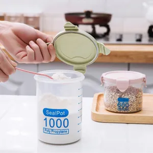 Plastic airtight food storage container with lid and scoop, kitchen grain organizer jar.