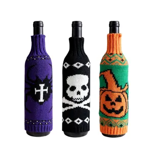 Set di tre copribottiglie di vino in maglia Halloween con teschio, zucca e croce