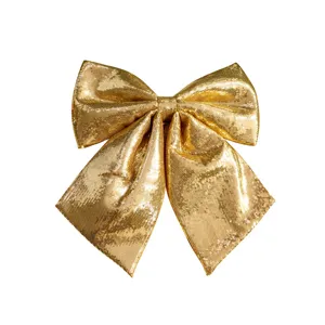 Large gold sequined Christmas bow decoration for holiday festive tree or wall hanging
