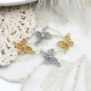 Detailed view of hollow butterfly metal charms for DIY jewelry making accessories