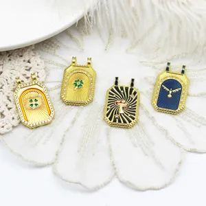 Vintage gold-plated tarot charms with enamel sun, mushroom, and clover details