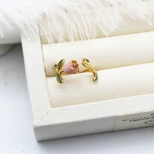 Detailed view of pink enamel rose open ring featuring an empty pearl setting for DIY