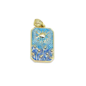 Vintage 18K gold plated rectangular pendant with blue enamel sun and flower design