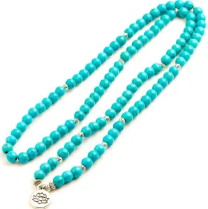 Turquoise 108 kralen mala ketting met lotus hanger en zilveren tussenkraaltjes voor yoga.