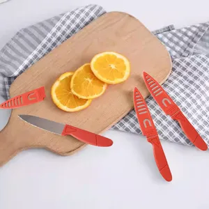 Stainless steel fruit knife set with red handle and protective sheath for home kitchen use.