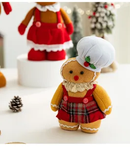 Close-up of a festive gingerbread man plush wearing a chef hat and red plaid skirt