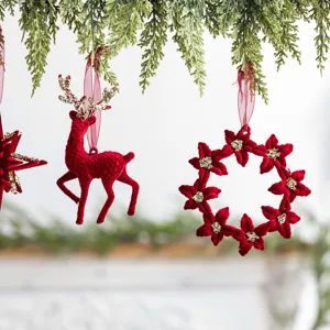 Elegant red flocked Christmas reindeer and floral wreath ornaments for tree
