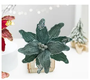 Detailed view of green velvet Christmas flower with silver sequins for DIY decor