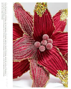 Close-up detail of burgundy velvet Christmas poinsettia flower with gold glitter edges