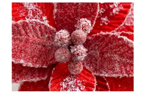 Detailed macro shot of red velvet Christmas flower with sparkling ice crystal decor