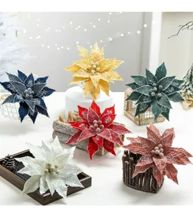 Group of colorful velvet Christmas poinsettia flowers with ice crystal texture