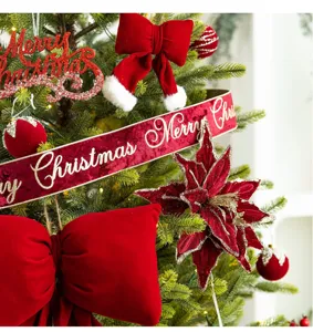 Close-up detail of burgundy velvet bows and flocked ornaments on a Christmas tree