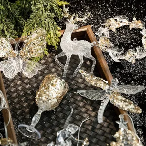 Transparent acrylic Christmas ornaments with gold and silver sequins in various shapes