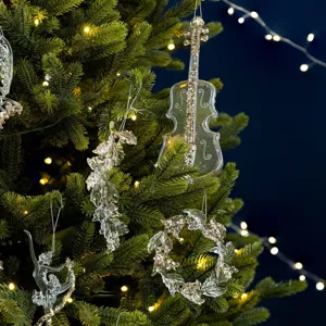 Transparent acrylic Christmas ornaments with sequins featuring violin and angel shapes